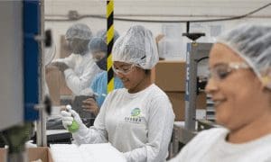 Assembly line smiling